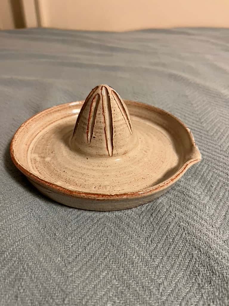 A ceramic juicer.