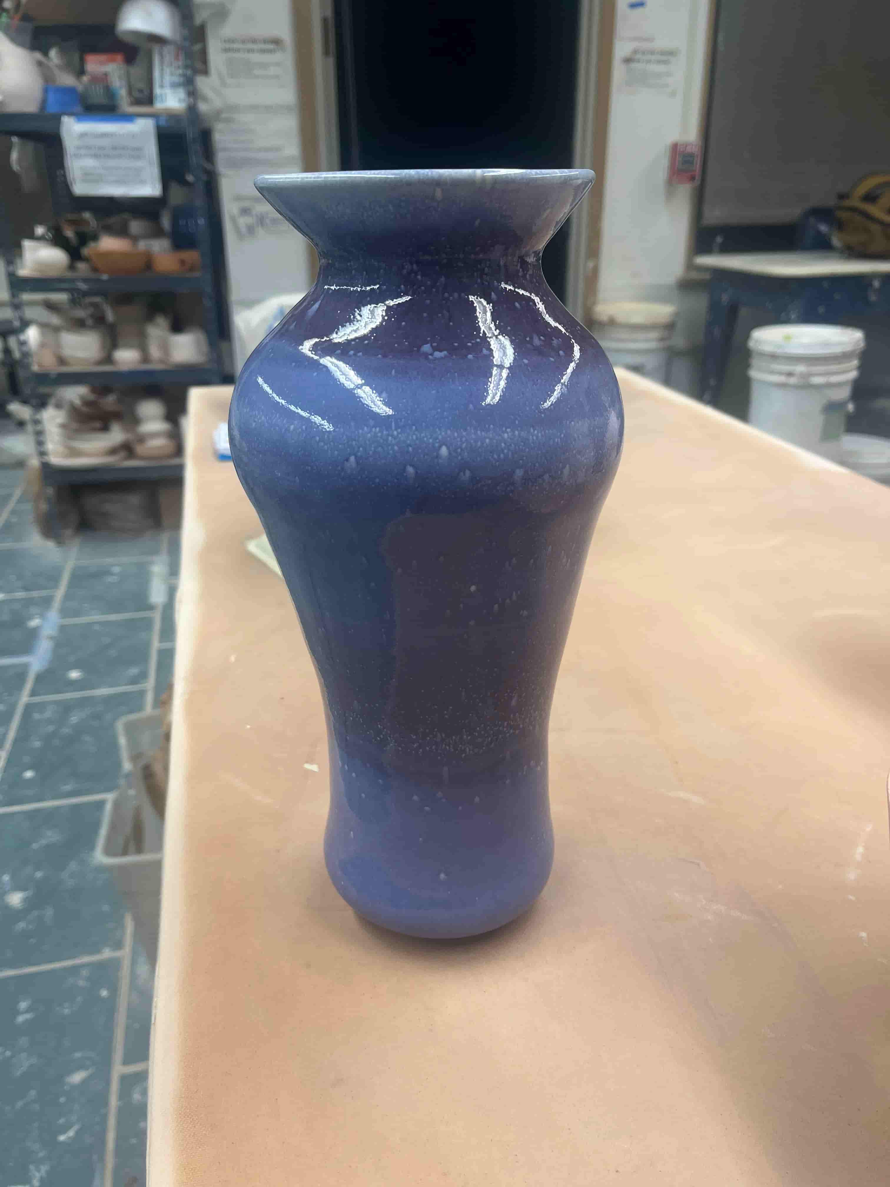 A tall blue vase.
