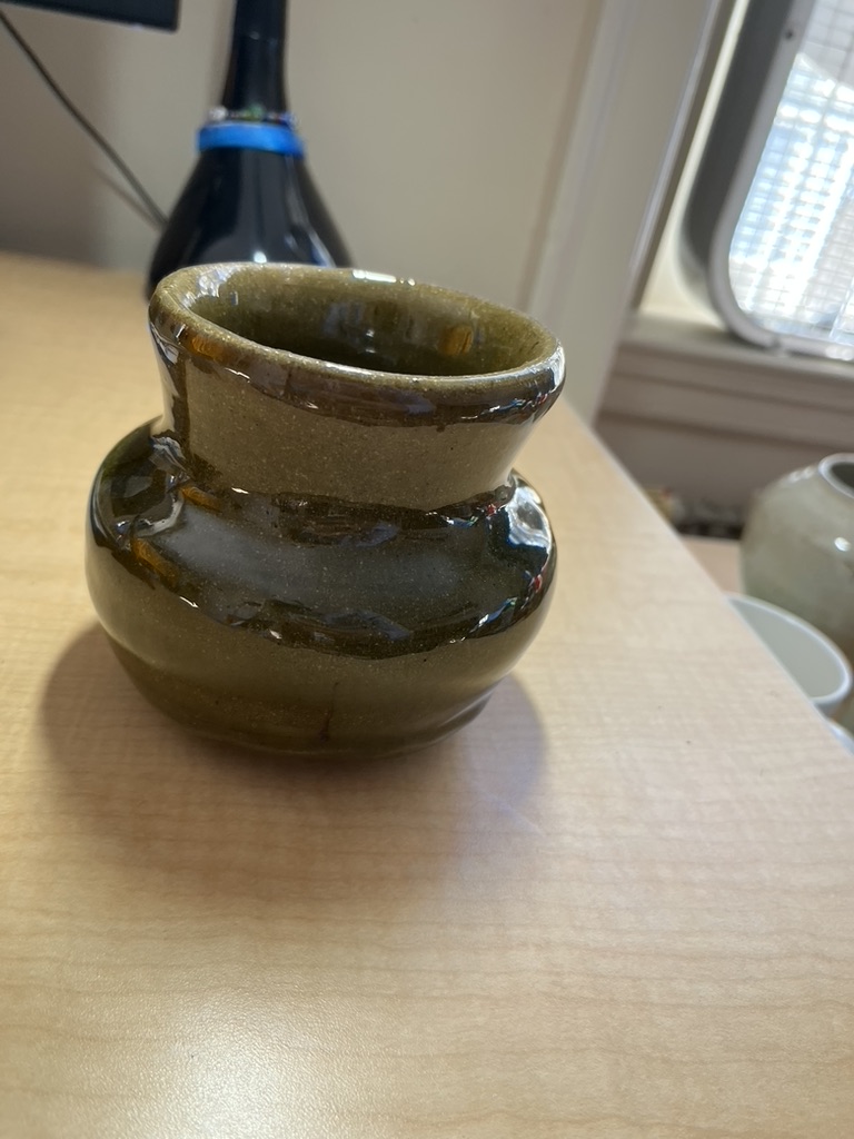 An ugly green vase.