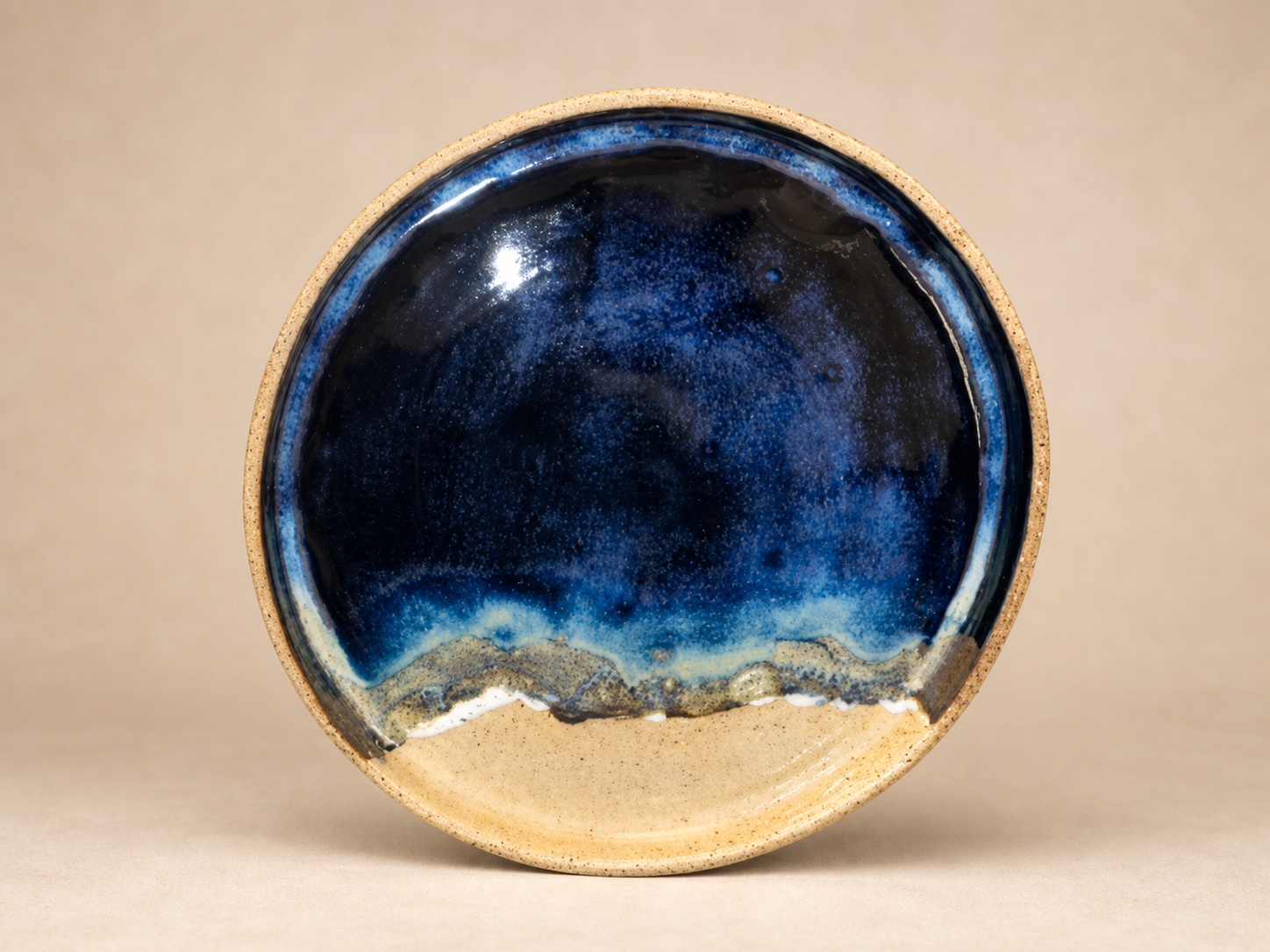 A ceramic beach plate.