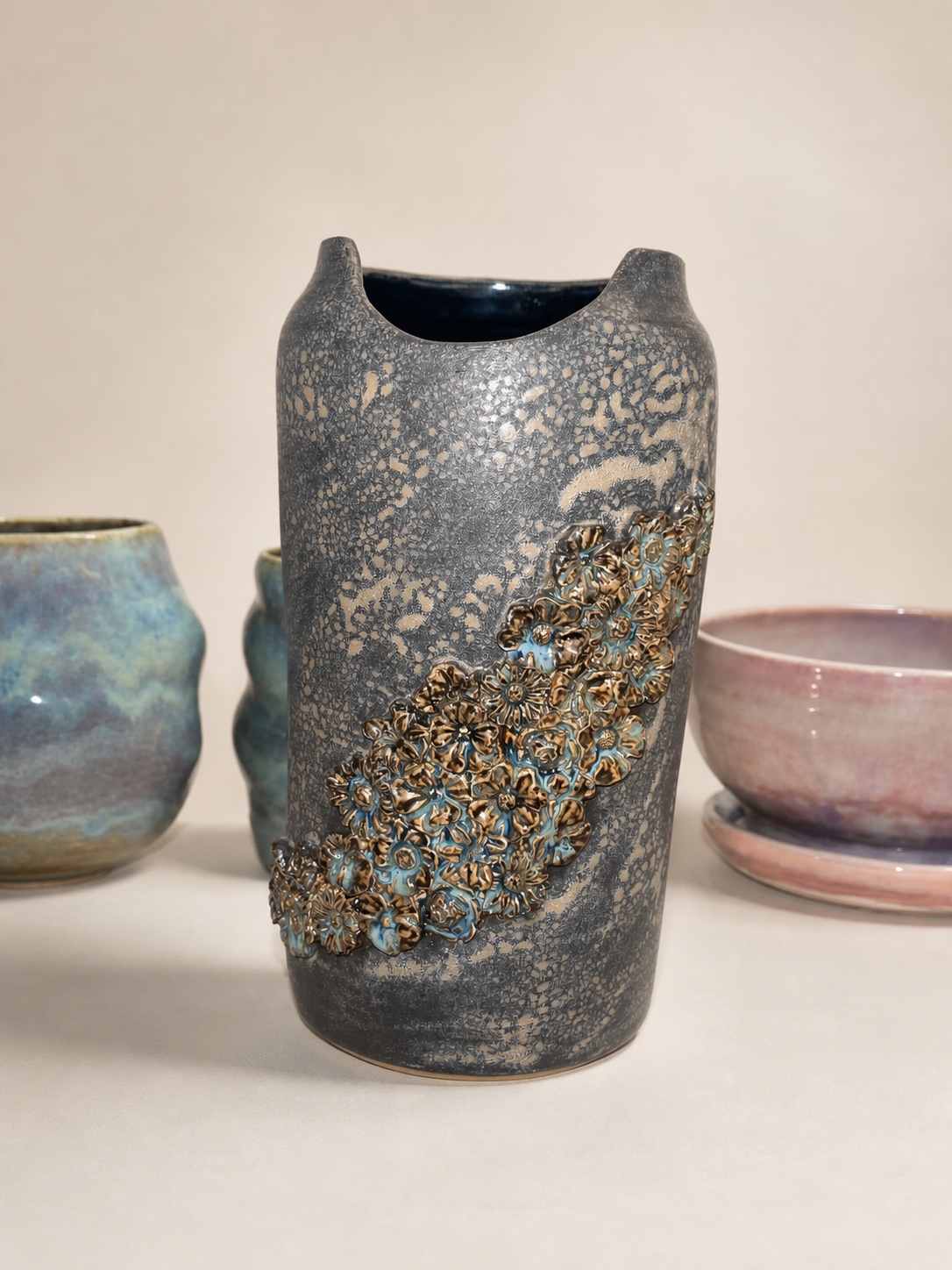 A sculptural flower vase.