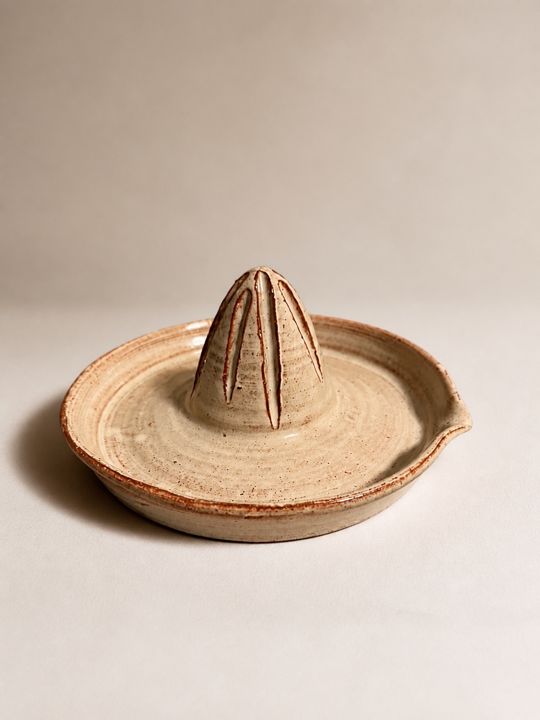 A ceramic juicer.