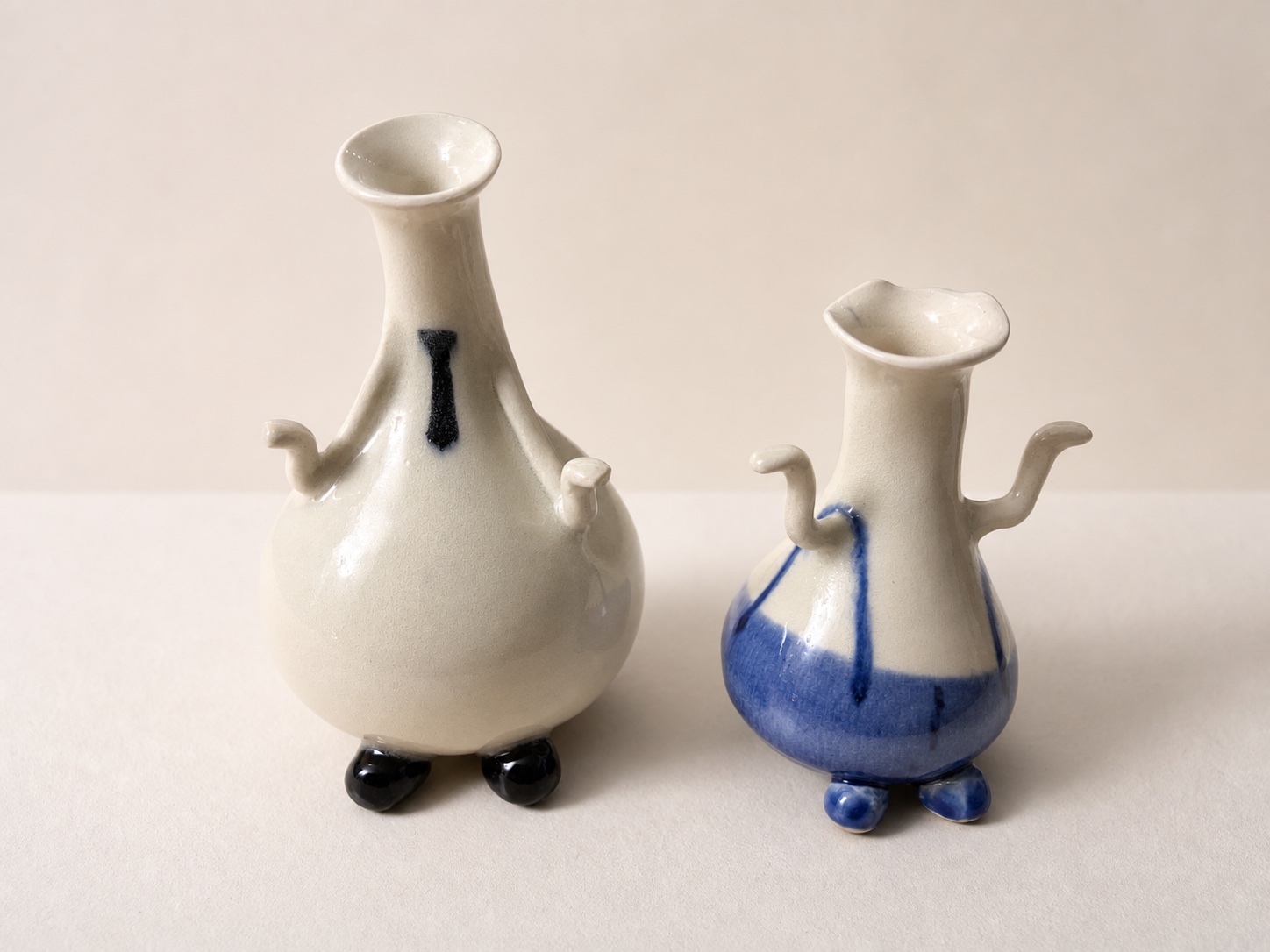 Two ceramic figures.