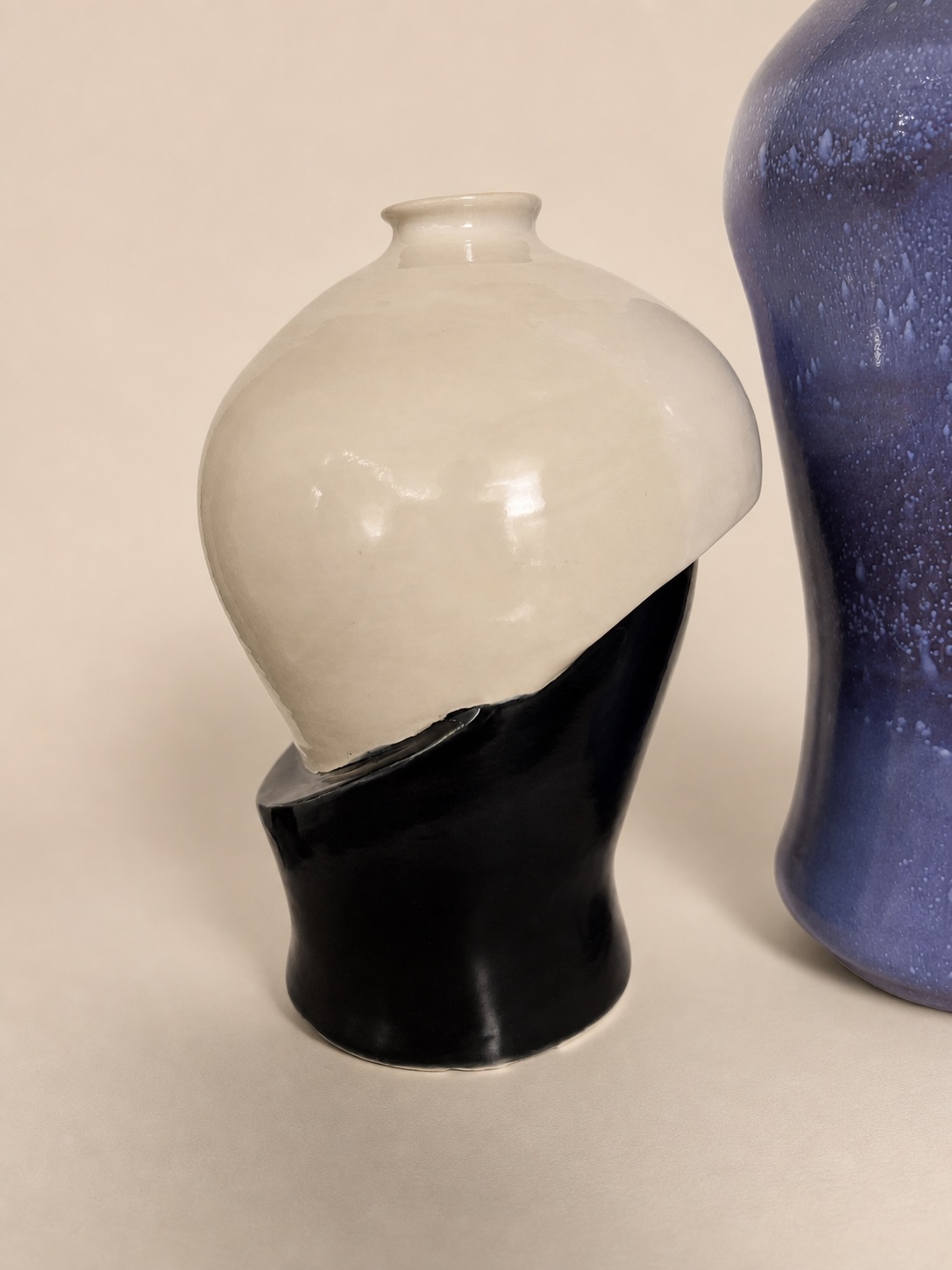A split ceramic vase.