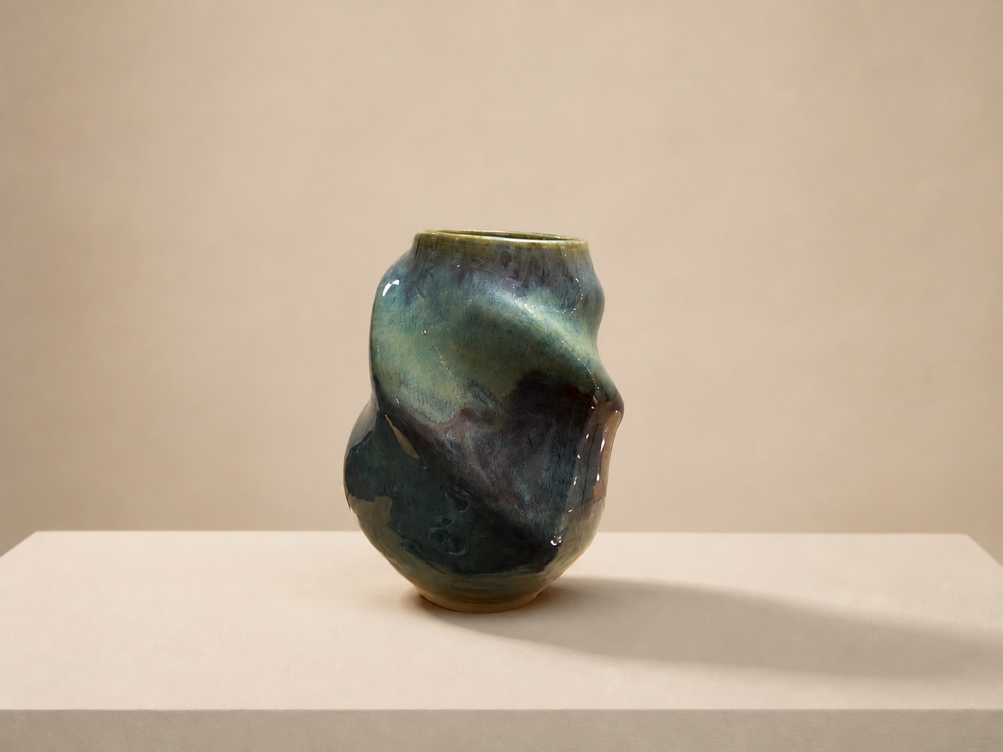 A swirly ceramic vase.