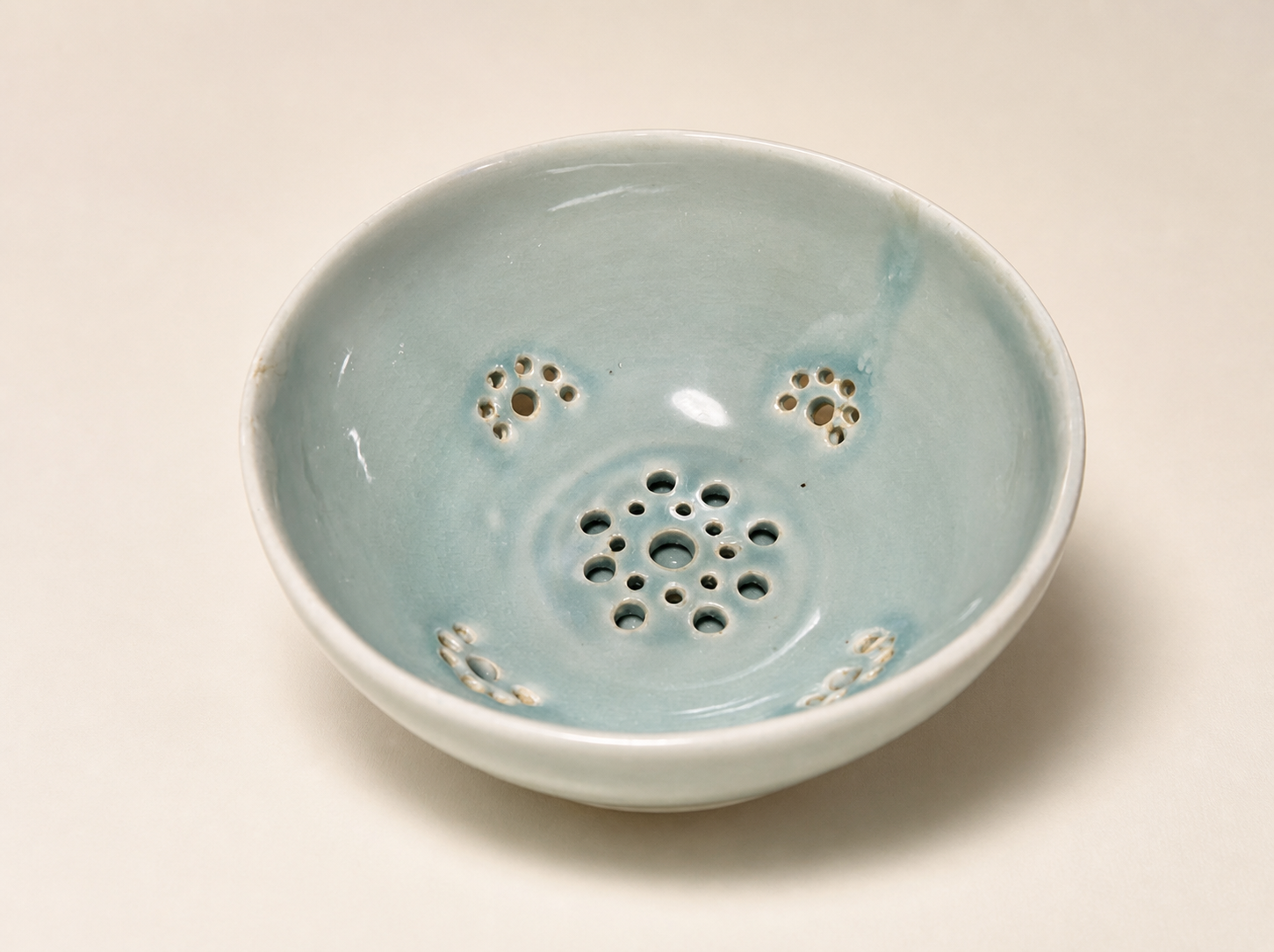 A light blue berry bowl.