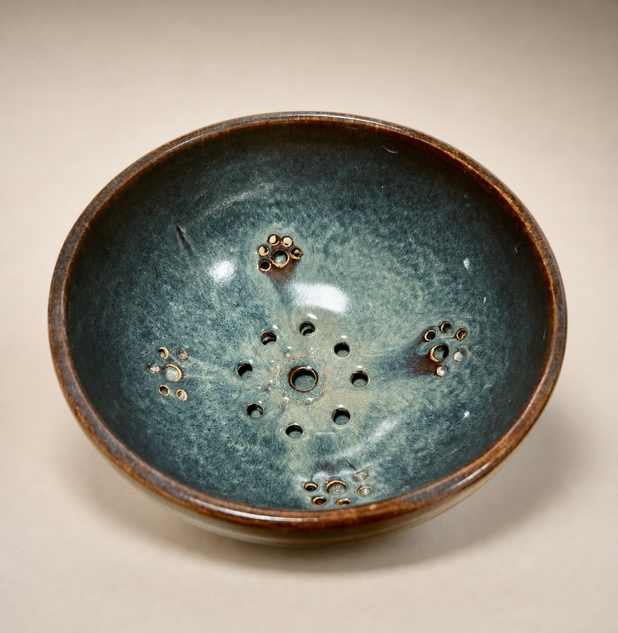 A textured berry bowl with an irregular rim.