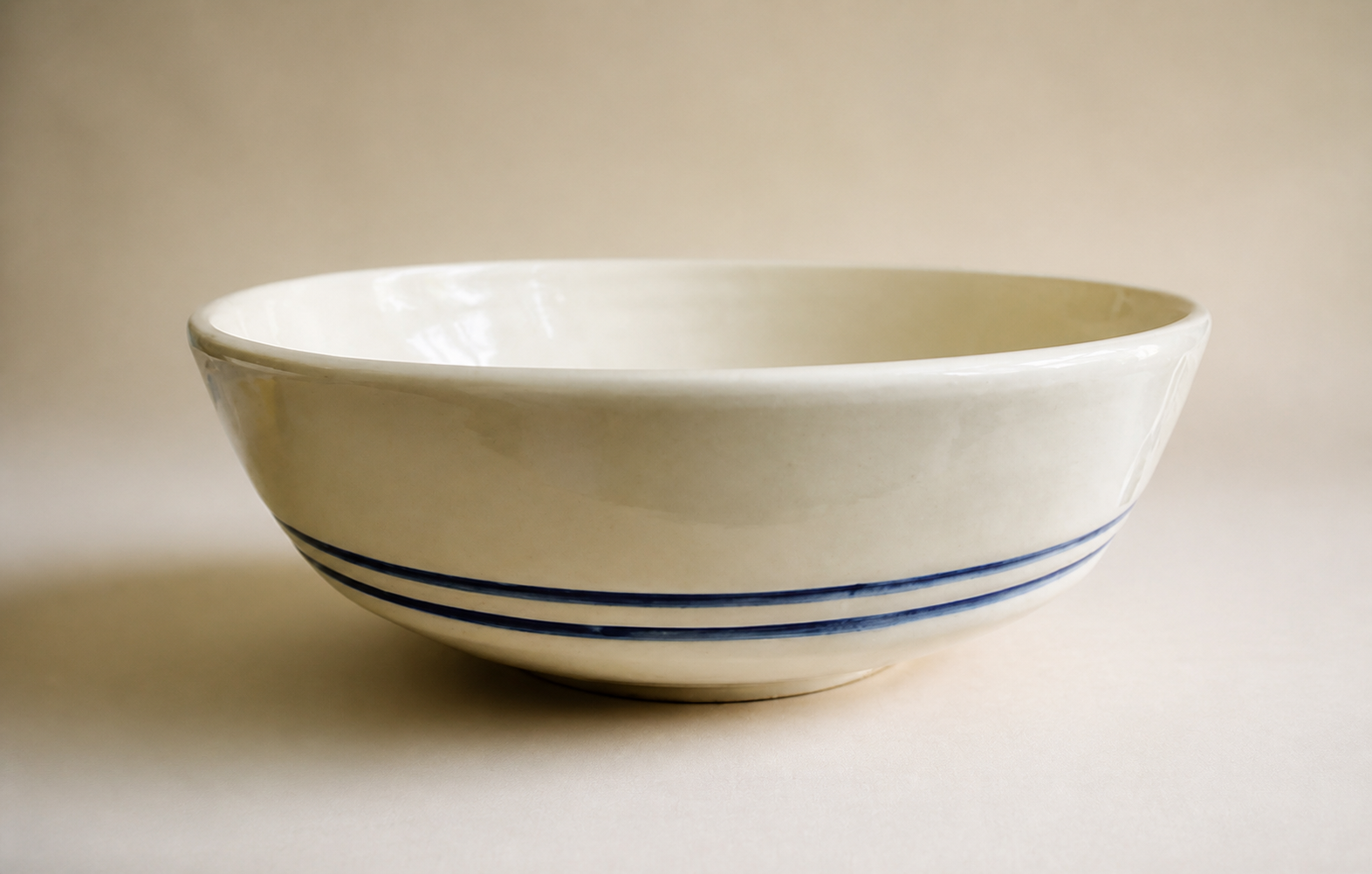 A large blue striped bowl.