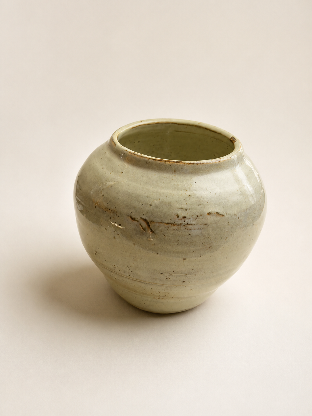 A small white vase.